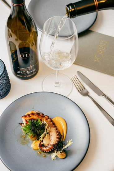 Food Pairing - At Portale in NYC, Michelin Star Chef Alfred Portale pairs Halleck Vineyard Russian River Valley Chardonnay from Balletto Vineyard grapes with his signature Polpo grilled octopus. (Scott Heins)